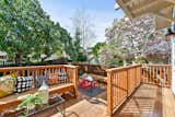 Outdoor, Back Yard, Wood Patio, Porch, Deck, Trees, Large Patio, Porch, Deck, Wood Fences, Wall, and Vertical Fences, Wall  Photo 20 of 69 in Classic Craftsman Update by Saikley Architects