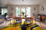 Dining room filled with vintage pieces from my own collection , the beautiful 1960s brutalist rug found during my travels to Miami and a simple Stilnovo linear pendant I got from Italy are some of the highlights of this remodeled open space 