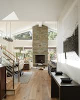 Living Room, Ceiling Lighting, Medium Hardwood Floor, Standard Layout Fireplace, Console Tables, and Gas Burning Fireplace  Photo 9 of 14 in Mark West Springs Rebuild by Richardson Pribuss Architects