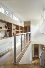 A double height stair and circulation space allows extra light and views inside.