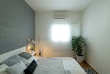 Wall Lighting and Light Hardwood Floor  Photo 12 of 17 in Airy & Light | Couple Apt by Shir Margolin