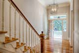 Staircase, Wood Tread, and Wood Railing Main Entry  Photo 6 of 17 in Liberty Manor by Historic Savannah Homes By Liza DiMarco