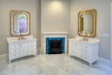 Owners Suite Bathroom~ Featuring Side by side Vanities and Decorative Fireplace