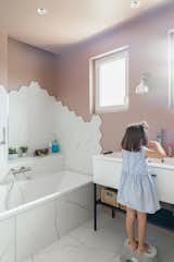 Bath Room, Ceramic Tile Floor, Ceiling Lighting, Wall Lighting, Ceramic Tile Wall, and Wall Mount Sink  Photo 19 of 22 in RGV House by Aurélien Aumond