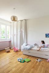 Bedroom, Ceiling Lighting, Light Hardwood Floor, and Bed  Photo 18 of 22 in RGV House by Aurélien Aumond