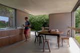 Kitchen, Wood Cabinet, Concrete Floor, and Ceiling Lighting  Photo 13 of 22 in RGV House by Aurélien Aumond