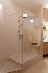 Bath Room, Open Shower, Pendant Lighting, Corner Shower, Ceramic Tile Floor, Ceiling Lighting, and Ceramic Tile Wall  Photo 9 of 11 in Saint Nizier by Aurélien Aumond