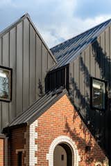 Exterior, Metal Roof Material, House Building Type, Gable RoofLine, Metal Siding Material, Brick Siding Material, and Stone Siding Material  Photo 16 of 19 in Rabbit House by Roth Sheppard Architects