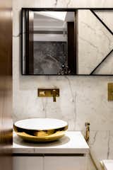 Bath Room, Marble Floor, Marble Wall, Recessed Lighting, One Piece Toilet, Marble Counter, Ceramic Tile Wall, and Vessel Sink Powder Room  Photo 13 of 27 in Mumbai by Ali Baldiwala