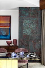 Poseidon wall in dining (backdrop,with copper repousse work in patina finish)