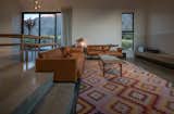 Concrete steps lead to sunken lounge