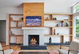 Custom fireplace with mid-century inspired shelving.