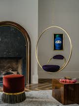 British Designer Lee Broom's Hanging Hoop Chair in the Living Room.