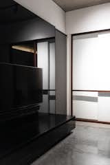 Black lacquered glass panel in the living room