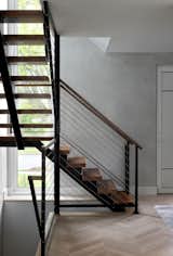 Wood and Steel Stairwell with view of White Oak Floors