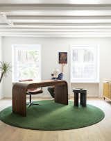 home office on the garden floor with Orior furniture, Yellowtrees table lamp, Kashall rug