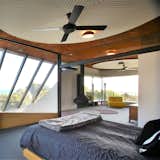 External materials are drawn internally. They are employed as horizontal planes which help frame a 180 degree panoramic view of the bay and coastal landscape.