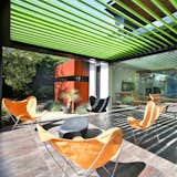 Outdoor living, inviting, comfortable and connecting the landscape to the interior.