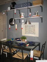 Perfectly workable dining room for four. Again notice the storage.  Remember you can always go up with storage with you’re trying to use your space most effectively.