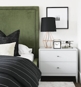 Second bedroom with green, black and gold aesthetic