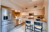Kitchen with original cabinets and countertops