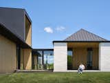 Exterior, Wood Siding Material, Hipped RoofLine, Metal Roof Material, and House Building Type Entry Terrace  Photo 6 of 14 in Dubhouse by everyday studio