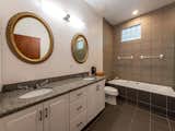 Bath Room, Drop In Tub, Ceiling Lighting, Corner Shower, Marble Counter, Enclosed Shower, Full Shower, Recessed Lighting, Ceramic Tile Wall, Undermount Sink, Porcelain Tile Floor, and Two Piece Toilet Pool Bath  Photo 3 of 29 in Butterfly Orchid Lane by Justin Askins