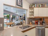 Kitchen, Recessed Lighting, Refrigerator, Engineered Quartz Counter, Range Hood, Undermount Sink, Cooktops, Wall Oven, Dishwasher, and Microwave Kitchen/Florida Room  Photo 6 of 29 in Butterfly Orchid Lane by Justin Askins