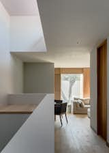 Living Room, Sofa, Recessed Lighting, Chair, and Medium Hardwood Floor  Photos from A Serene Home in Mexico Weaves Around Verdant Gardens