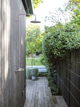Black Pivot Doors Frame Views of This Australian Home’s Verdant Garden - Photo 19 of 25 - 
