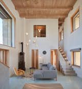 Living, Chair, Hanging, Sofa, End Tables, Coffee Tables, Rug, Ceiling, Lamps, and Sectional  Living Hanging Lamps Chair End Tables Photos from Romantic Ruins Enclose a Modern House in the Czech Republic
