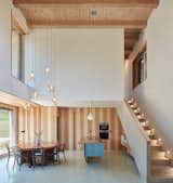 Dining Room, Table, Ceiling Lighting, and Chair  Photos from Romantic Ruins Enclose a Modern House in the Czech Republic