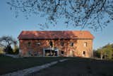 Exterior, Gable RoofLine, Brick Siding Material, and House Building Type  Photos from Romantic Ruins Enclose a Modern House in the Czech Republic
