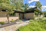 Classic mic-century exterior  Photo 1 of 10 in Mid-Century Makeover by Byrd Design And Build