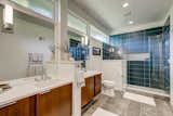 Master bathroom with beautiful, vibrant shower tile