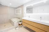 Modern Primary bathroom with floating oak vanity
