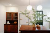 Kitchen, Refrigerator, Pendant Lighting, Recessed Lighting, and White Cabinet  Photo 6 of 6 in Cozy Cottage in North Carolina by Kendis Charles