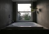 En-suite bathroom with feature bath tub