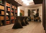 Dining Room with bespoke table (created with parametric modelling), bespoke library shelving units and feature ceiling
