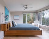 Bedroom, Chair, Medium Hardwood Floor, and Bed  Photo 12 of 17 in Hilltop House by Elizabeth Herrmann Architecture + Design