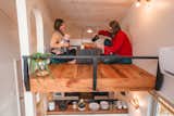 Architect Rob Maddox and Designer Karie Reinertson of Shelter Design Studio enjoy tea in the tea loft. The tea caddy features an extra long handle, so that when it’s placed on a special shelf in the kitchen below, it can be lifted easily into the loft. 