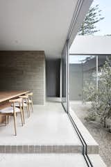A Concrete House Is Softened by an Airy Internal Courtyard, Complete With an Olive Grove - Photo 4 of 19 - 