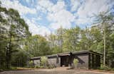 A Shou Sugi Ban Dwelling Blends Seamlessly Into Michigan’s Woodlands - Photo 1 of 17 - 