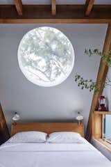 Round skylights allow for nighttime stargazing, while bedside windows provide ocean views at sunrise.&nbsp;&nbsp;