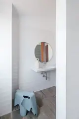 The simplicity of the bathroom keeps it as low maintenance as the rest of the house.