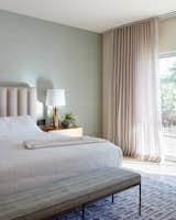 The bedrooms have a gauzy sheer layer of ripplefold draperies for soft light and some privacy during the day, with a separate blackout layer for the evenings.