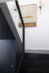 The stair's balustrade is original to the home.