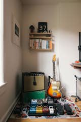 While Timothy has guitars throughout the house, he keeps the majority of his music equipment in his study, where it makes a fun, colorful corner.