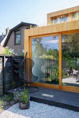 The hanging deck chair comes from a local garden shop.