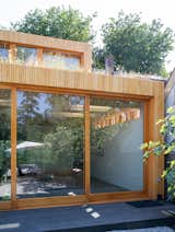 The addition allowed space for a rooftop garden as well as increased square footage upstairs for the master bedroom and Christine's study.  For the new construction, HOP used Accoya cladding, a highly sustainable,  durable, acetylated wood developed by a local Dutch company.